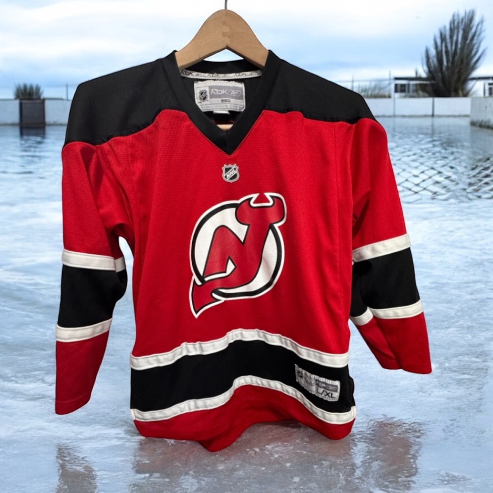 Vintage CCM rbk NHL Martin brodeur Youth Jersey - Red and Black size l/xl